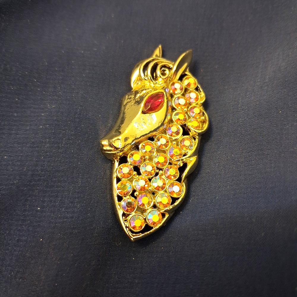 Elegant Gold Tone Horse Brooch